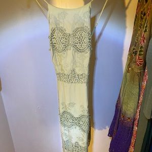 Light green strappy lacey knee-length dress